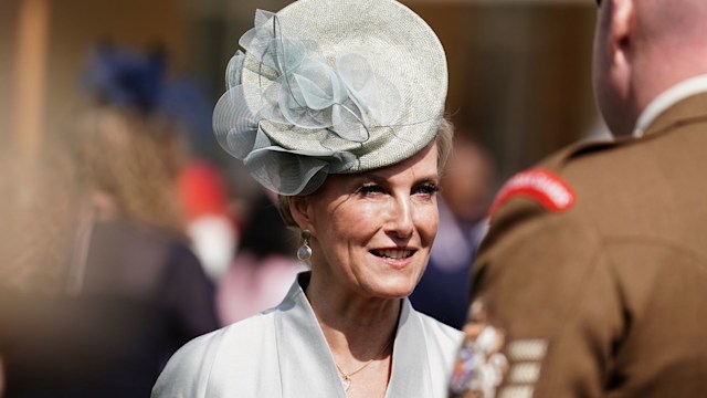 Duchess Sophie charms in silky belted dress for fairytale garden party