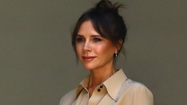 Victoria Beckham with her hair up on the runway at the Victoria Beckham show during London Fashion Week September 2019.