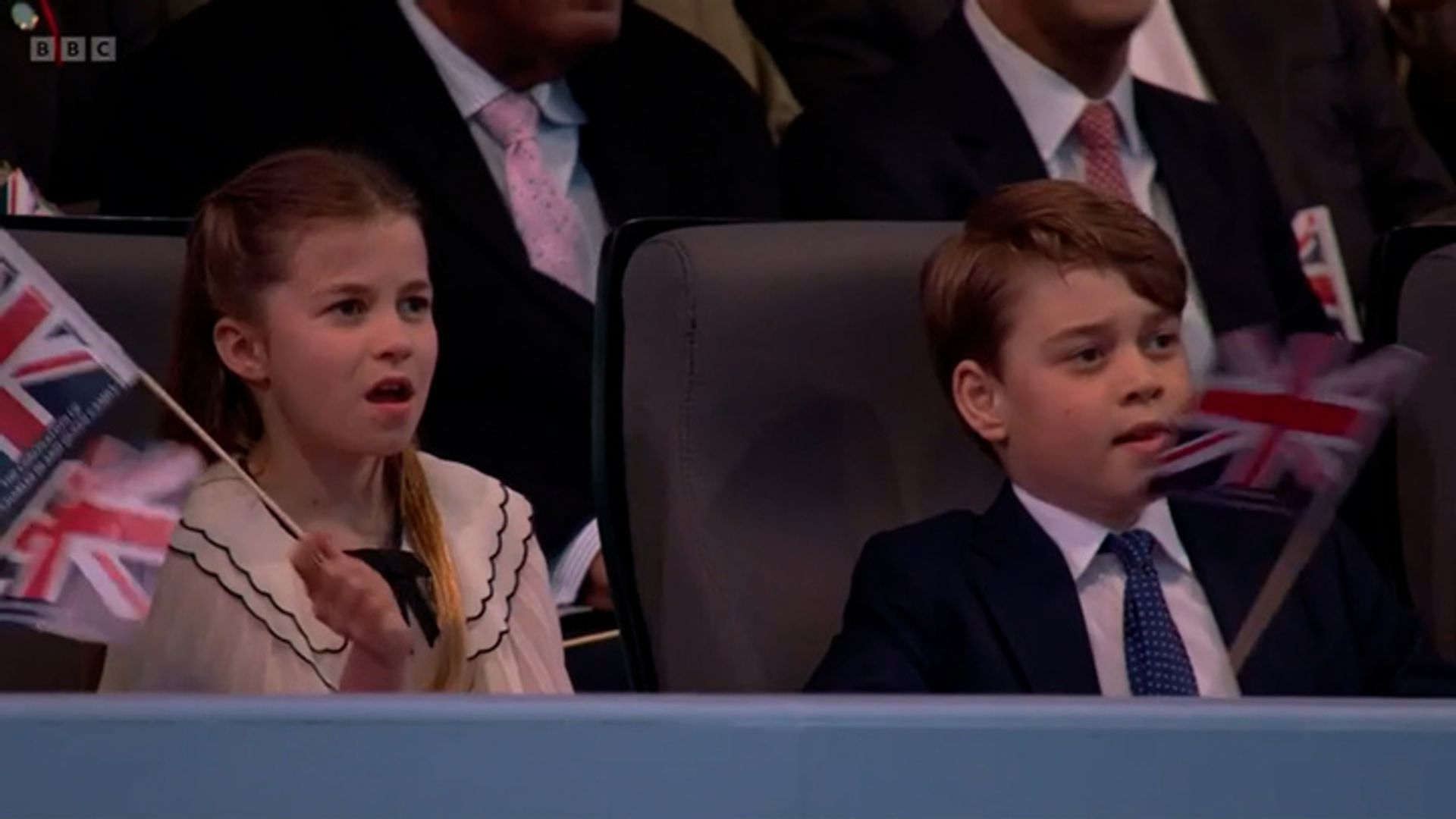 Princess Charlotte and Prince George singing along a the coronation concert