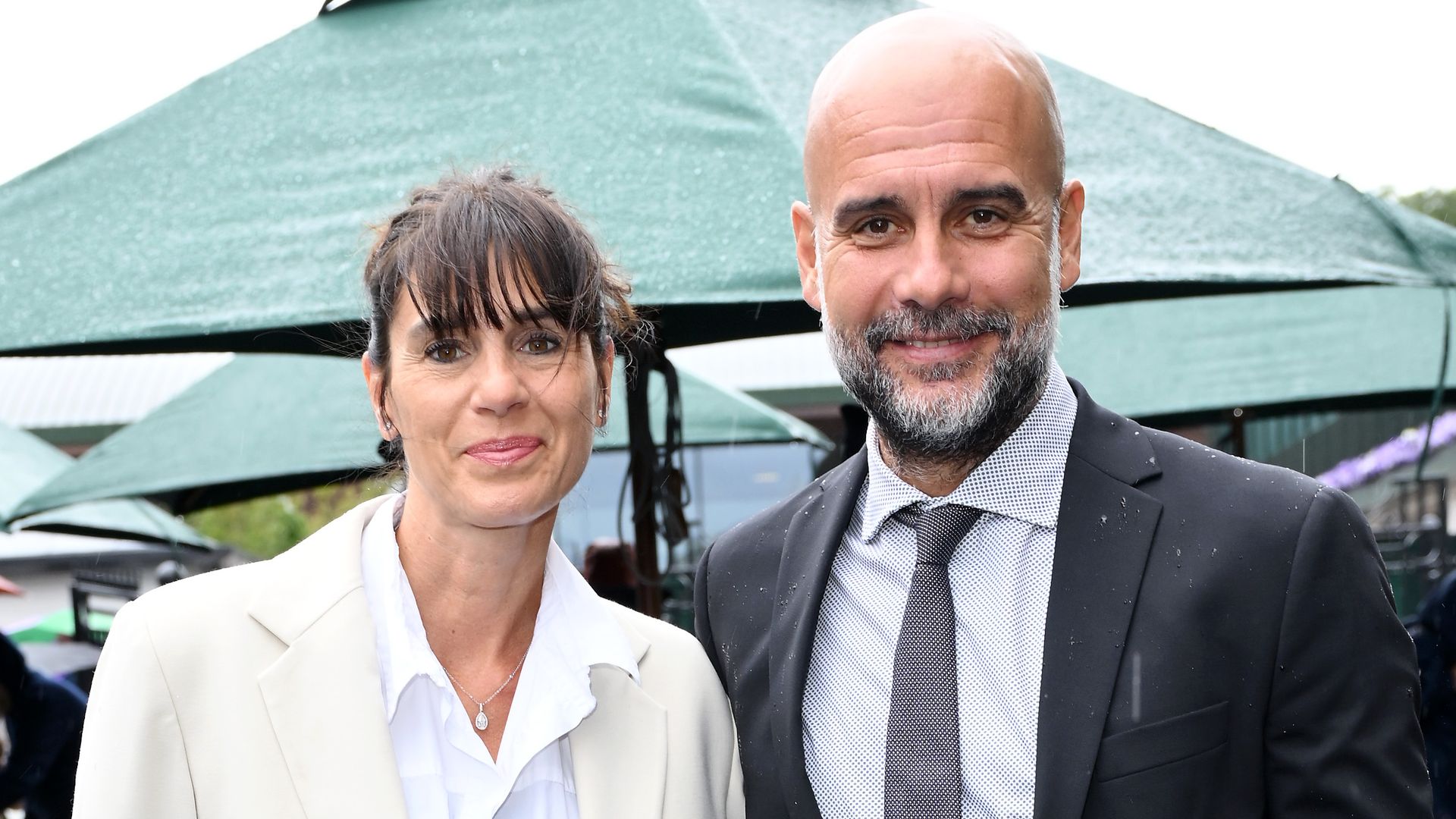 Cristina Serra and Pep Guardiola attend day six of the Wimbledon Tennis Championships at the All England Lawn Tennis and Croquet Club on July 06, 2024