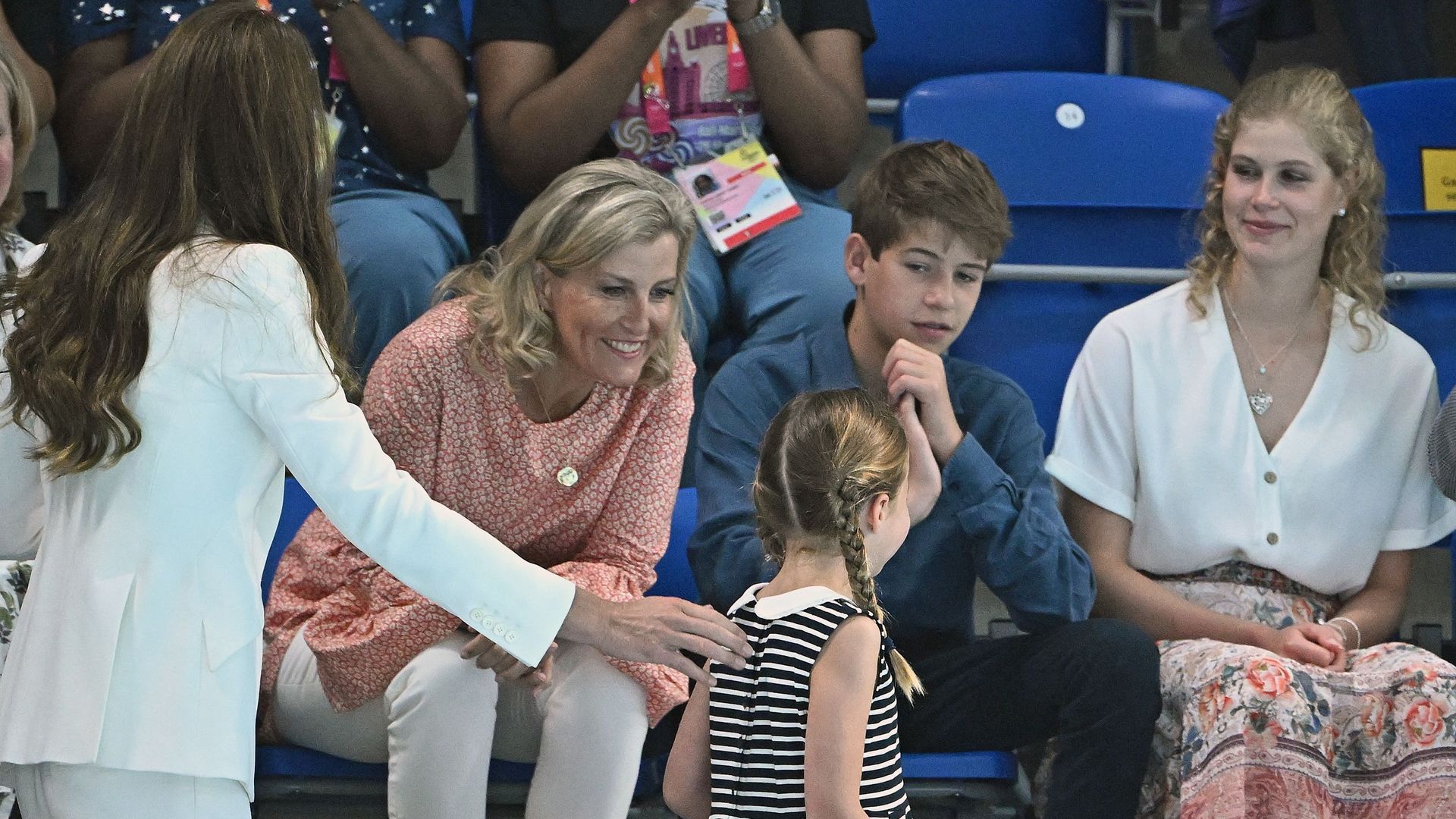 Lady Louise smiling at Kate and Princess Charlotte at the Commonwealth Games in Birmingham in 2022