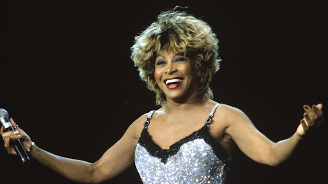 tina turner silver sequin mini dress performing in concert 1997