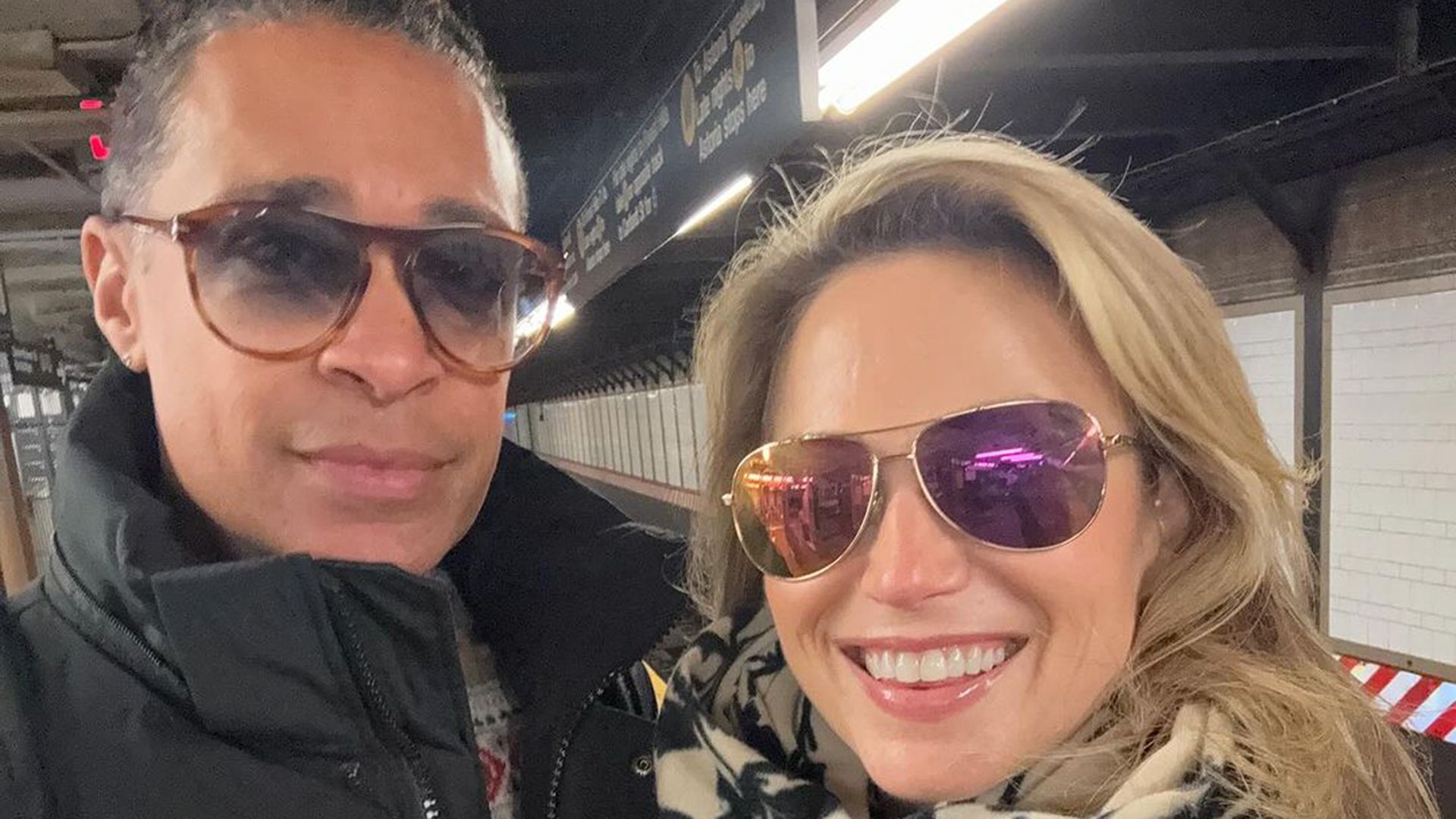 Amy Robach and T.J. Holmes getting the subway