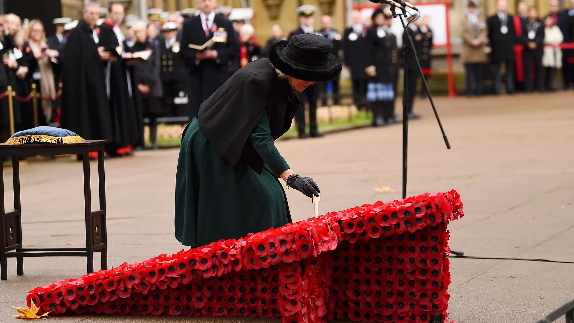 Queen Camilla places cross at 95th Field of Remembrance