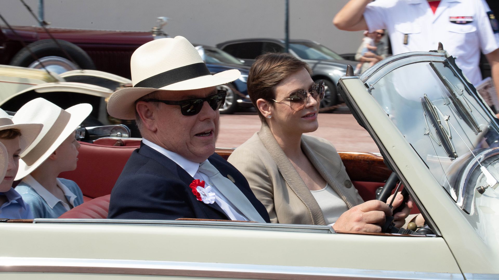 Prince Albert and Princess Charlene drive in vintage car