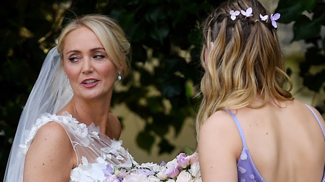 Anne-Marie Corbett on her wedding day with her bridesmaid and daughter