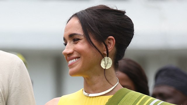 Britain's Prince Harry (2ndR), Duke of Sussex, and  Britain's Meghan (R), Duchess of Sussex, react as Lagos State Governor, Babajide Sanwo-Olu (unseen), gives a speech at the State Governor House in Lagos on May 12, 2024 as they visit Nigeria as part of celebrations of Invictus Games anniversary.