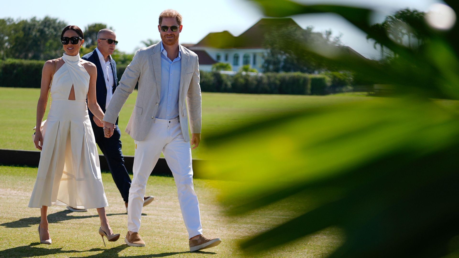 Prince Harry and wife Meghan Markle arrive for the 2024 Royal Salute Polo Challenge to Benefit Sentebale