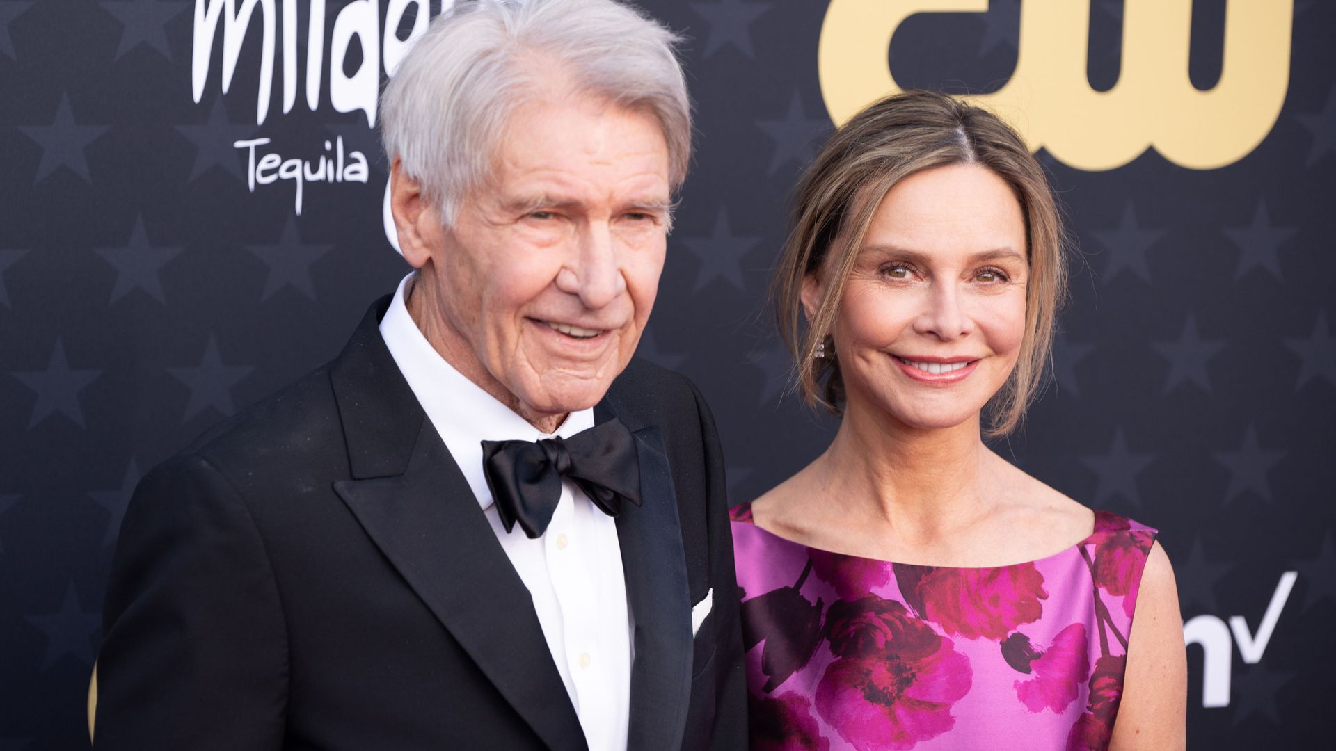Harrison Ford's wife Calista Flockhart, 59, dazzles in figure-hugging suit during Emmy red carpet appearance