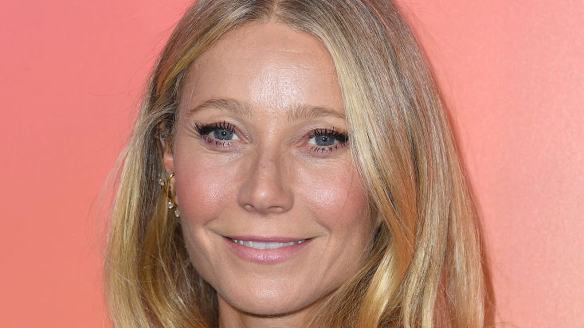 Close up of Gwyneth Paltrow smiling. 