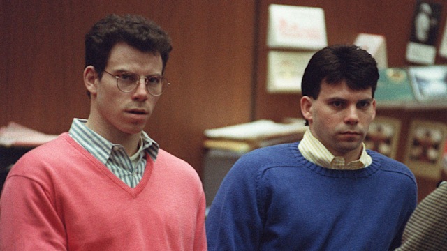 Erik Menendez (L) and his brother Lyle (R) listen during a pre-trial hearing, on December 29, 1992 in Los Angeles after the two pleaded innocent in the August 1989 shotgun deaths of their wealthy parents, Jose and Mary Louise Menendez of Beverly Hills, Calif