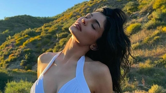 Kylie Jenner shared an Instagram post wearing a white mini dress from her brand's latest collection