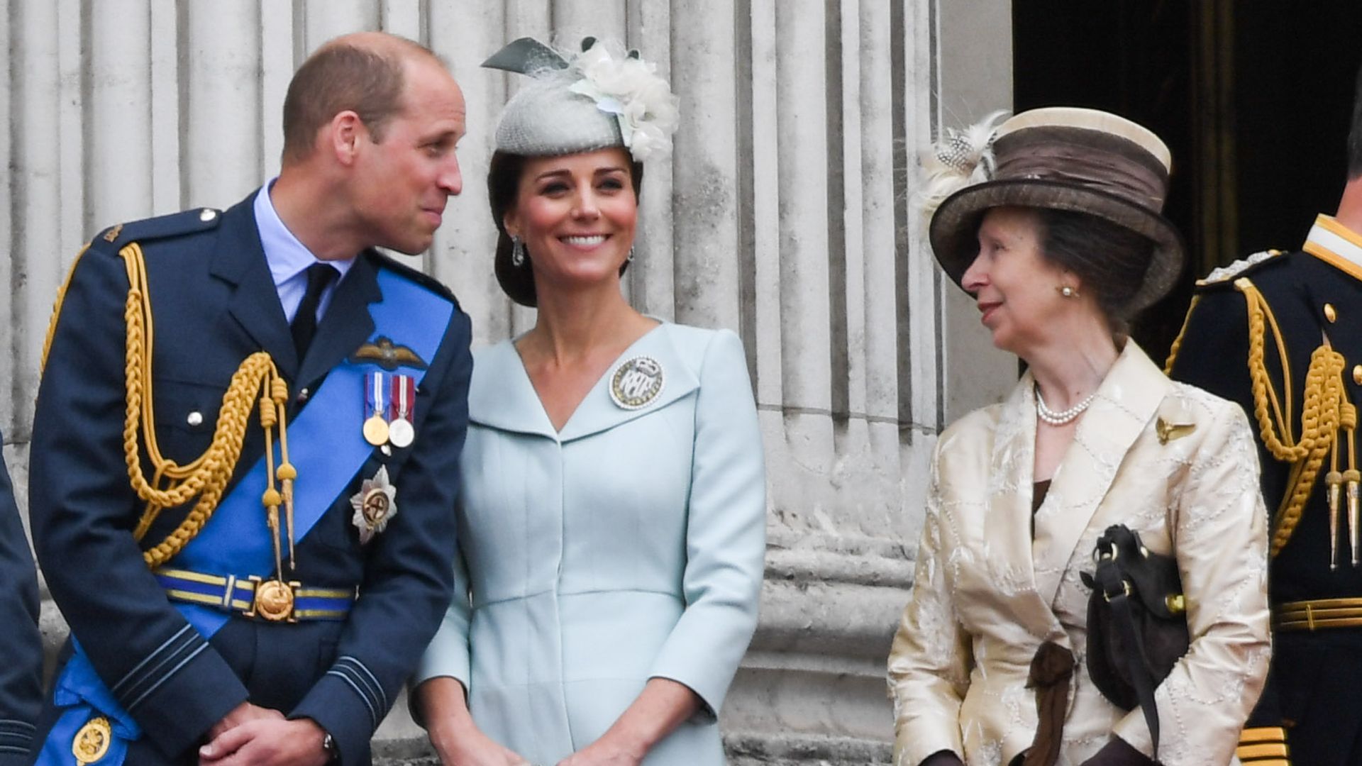 Anne speaking with William and Kate on palace balcony