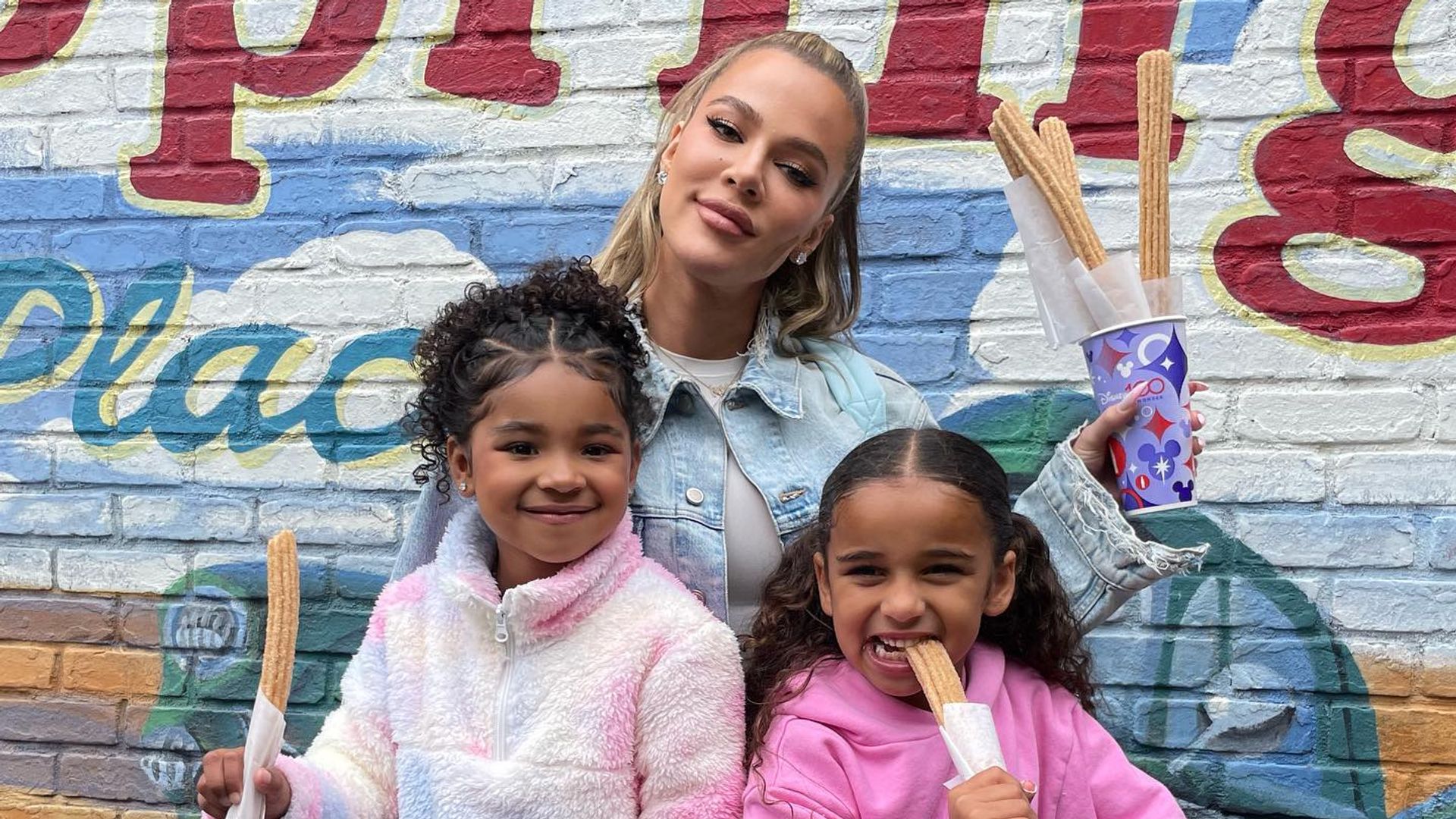 Khloe with true and dream at disney