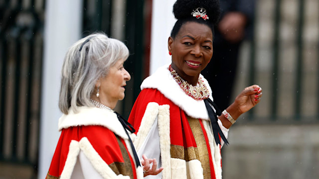 Baroness Dame Floella Benjamin (R), selected to carry the Sovereign's sceptre with dove, which represents spirituality, equity and mercy arrives at Westminster Abbey 