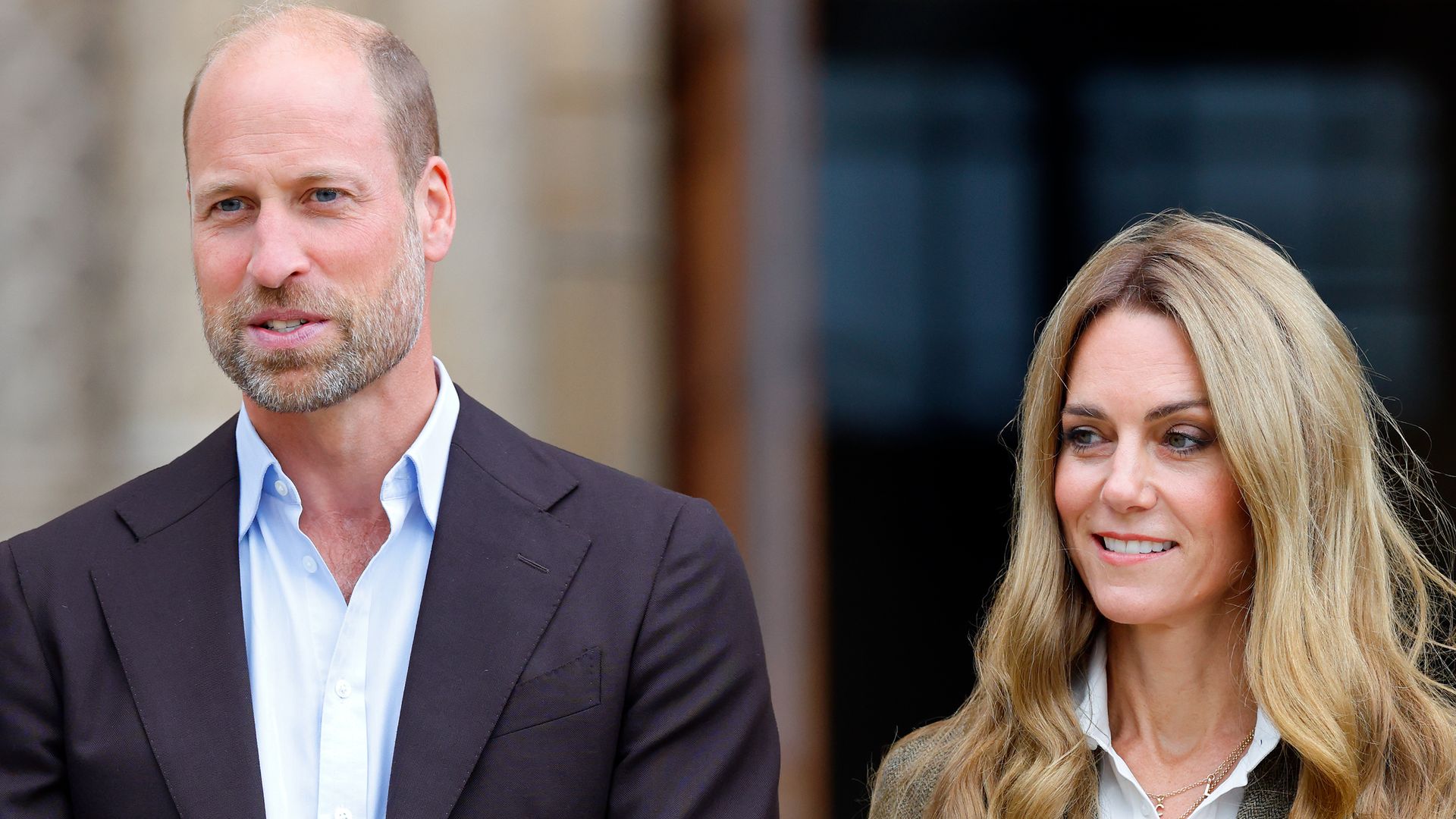 Prince William and Catherine, Princess of Wales side by side in blazers