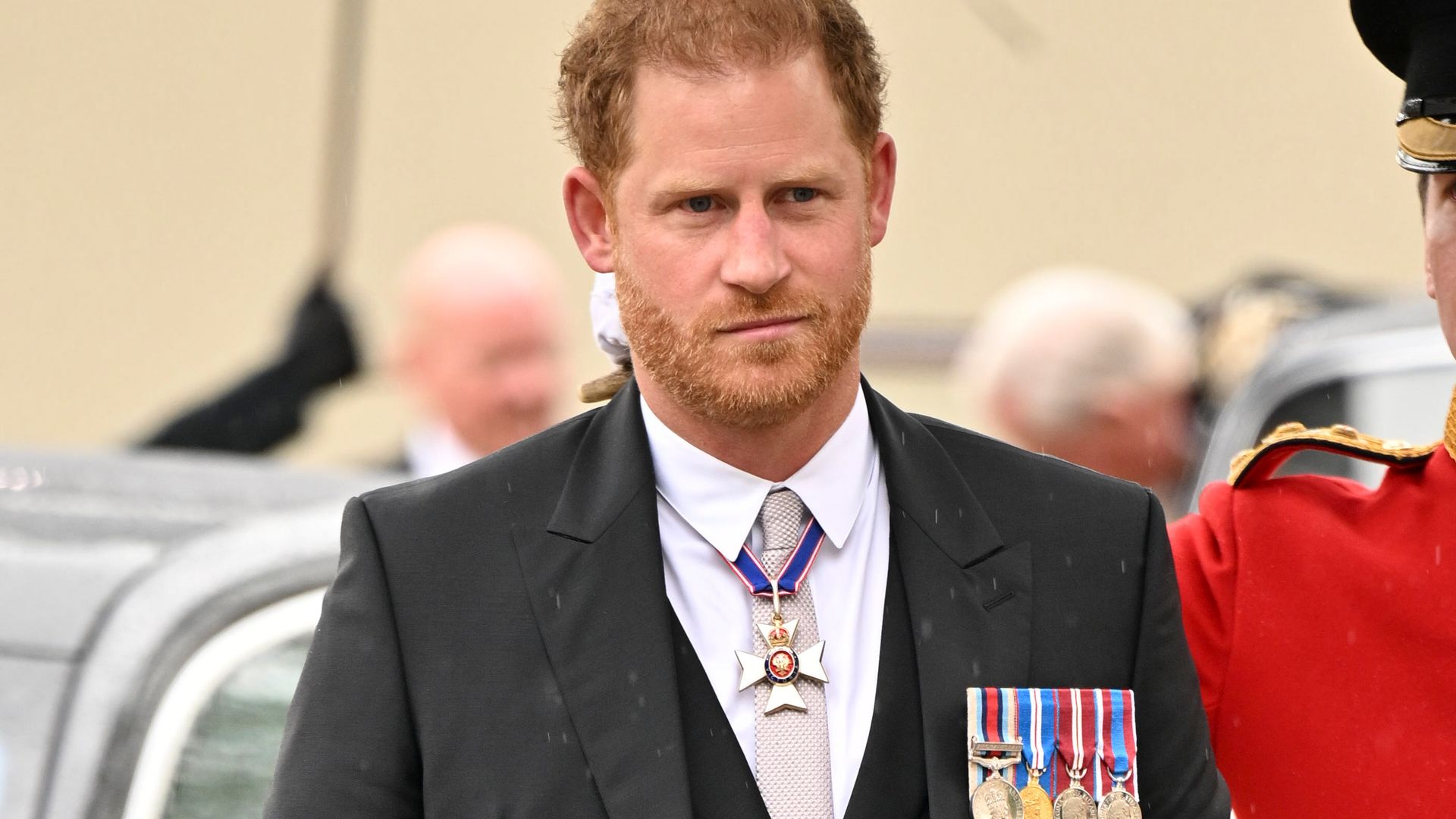 Prince Harry, Duke of Sussex arrives for the Coronation of King Charles III and Queen Camilla at Westminster Abbey on May 6, 2023 in London, England. The Coronation of Charles III and his wife, Camilla, as King and Queen of the United Kingdom of Great Britain and Northern Ireland, and the other Commonwealth realms takes place at Westminster Abbey today. Charles acceded to the throne on 8 September 2022, upon the death of his mother, Elizabeth II. (Photo by Andy Stenning  - WPA Pool/Getty Images)