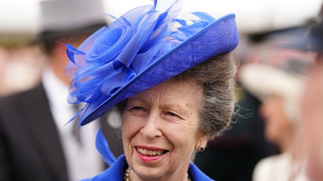 Princess Anne in blue hat