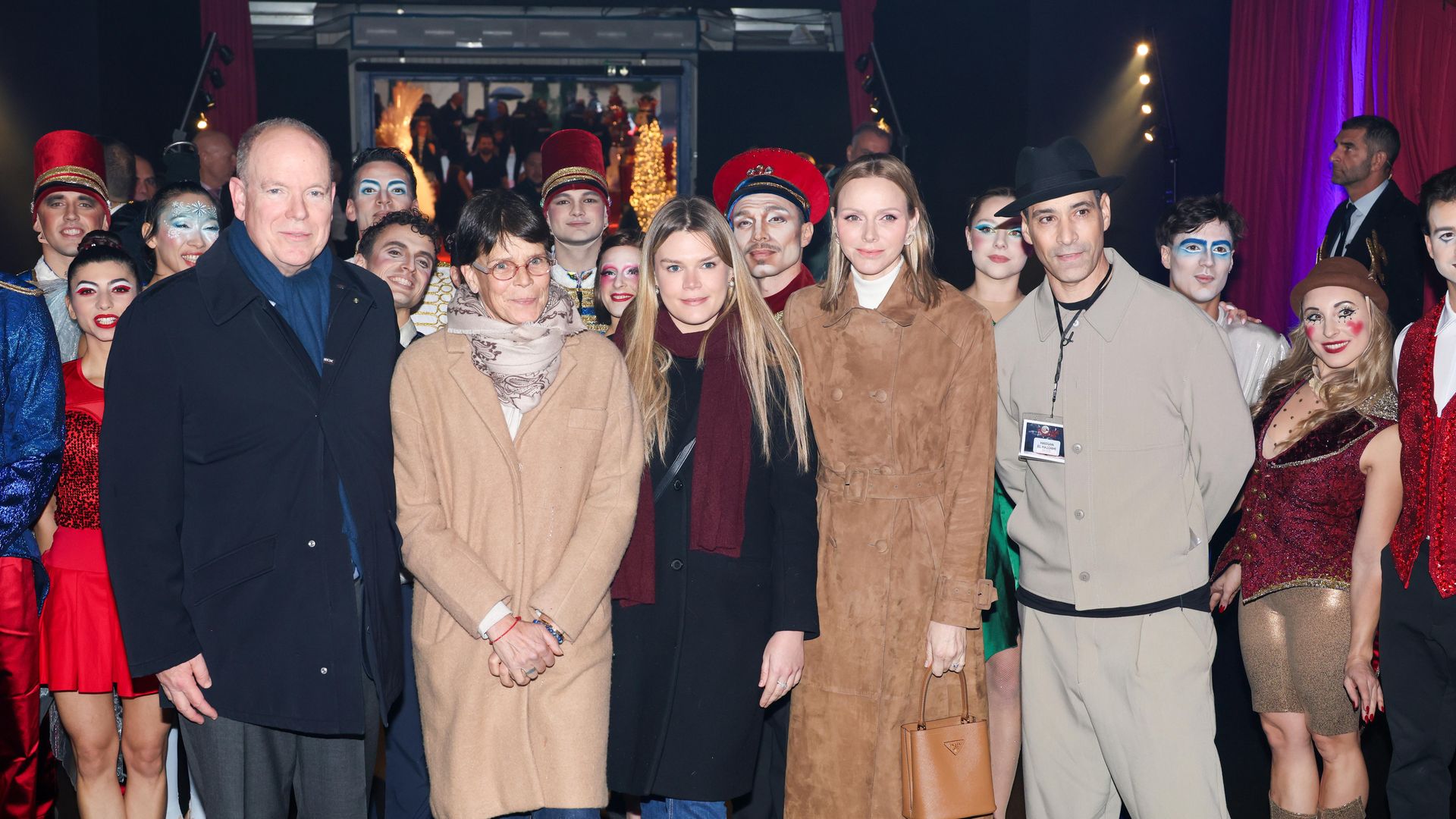 Prince Albert standing with Princess Stephanie, Camille Gottlieb and Princess Charlene
