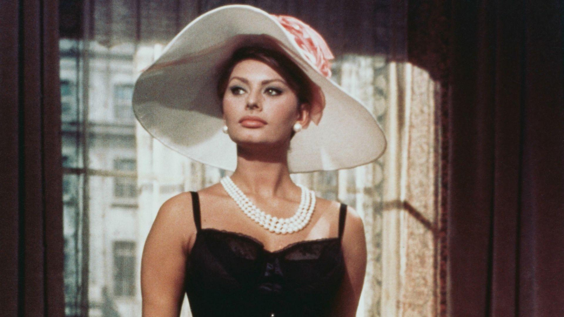 Sophia Loren wearing a black corset in 'The Millionairess' 