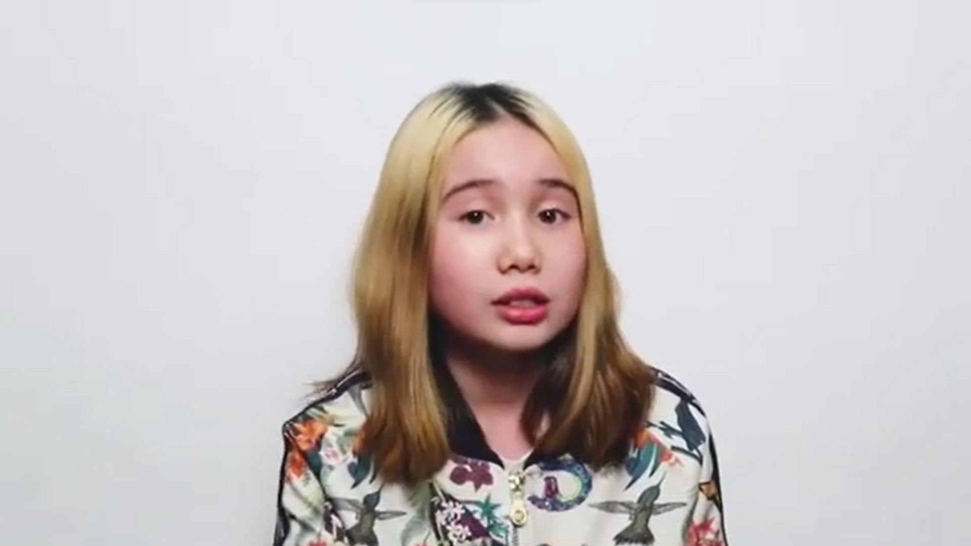 Lil Tay speaks to the camera