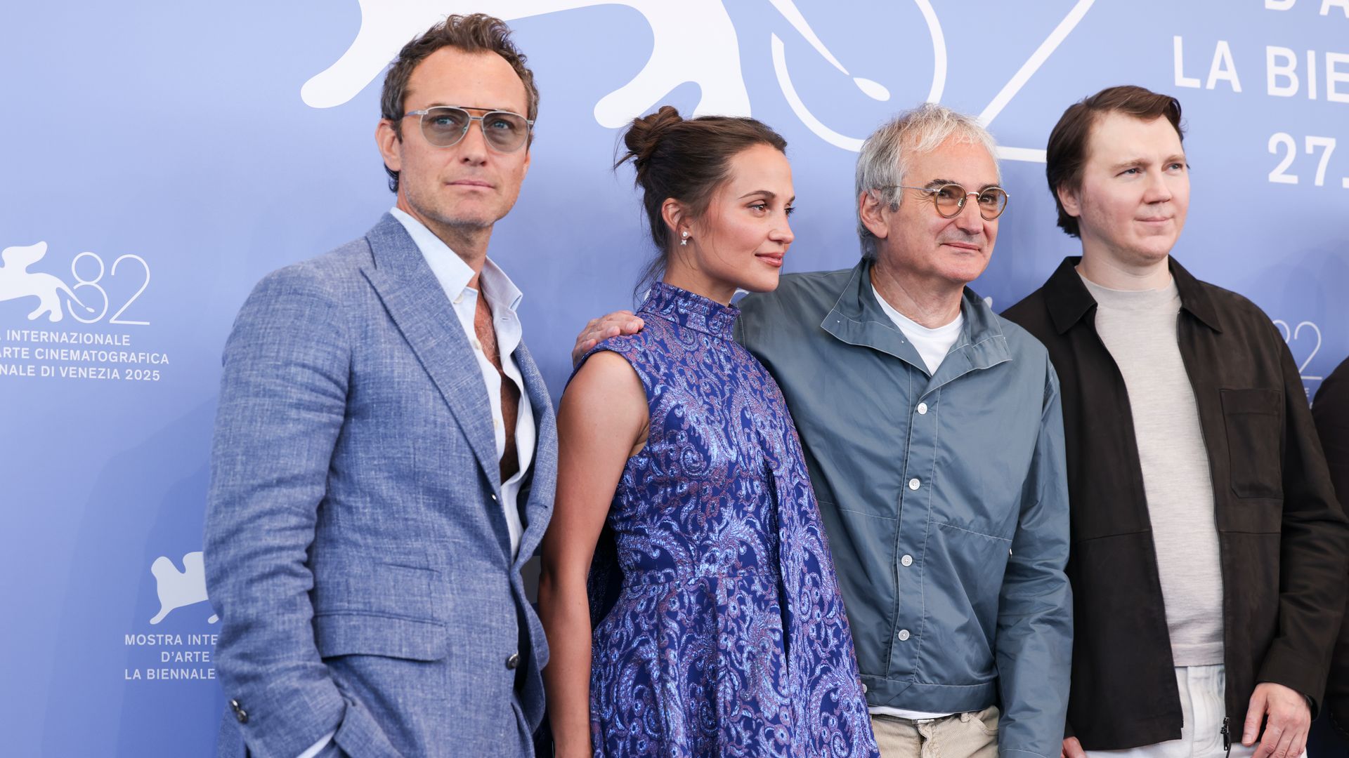 Jude Law, Alicia Vikander, Olivier Assayas and Paul Dano attend "The Wizard Of The Kremlin" (Le Mage Du Kremlin) photocall during the 82nd Venice International Film Festival on August 31, 2025 in Venice, Italy. 
