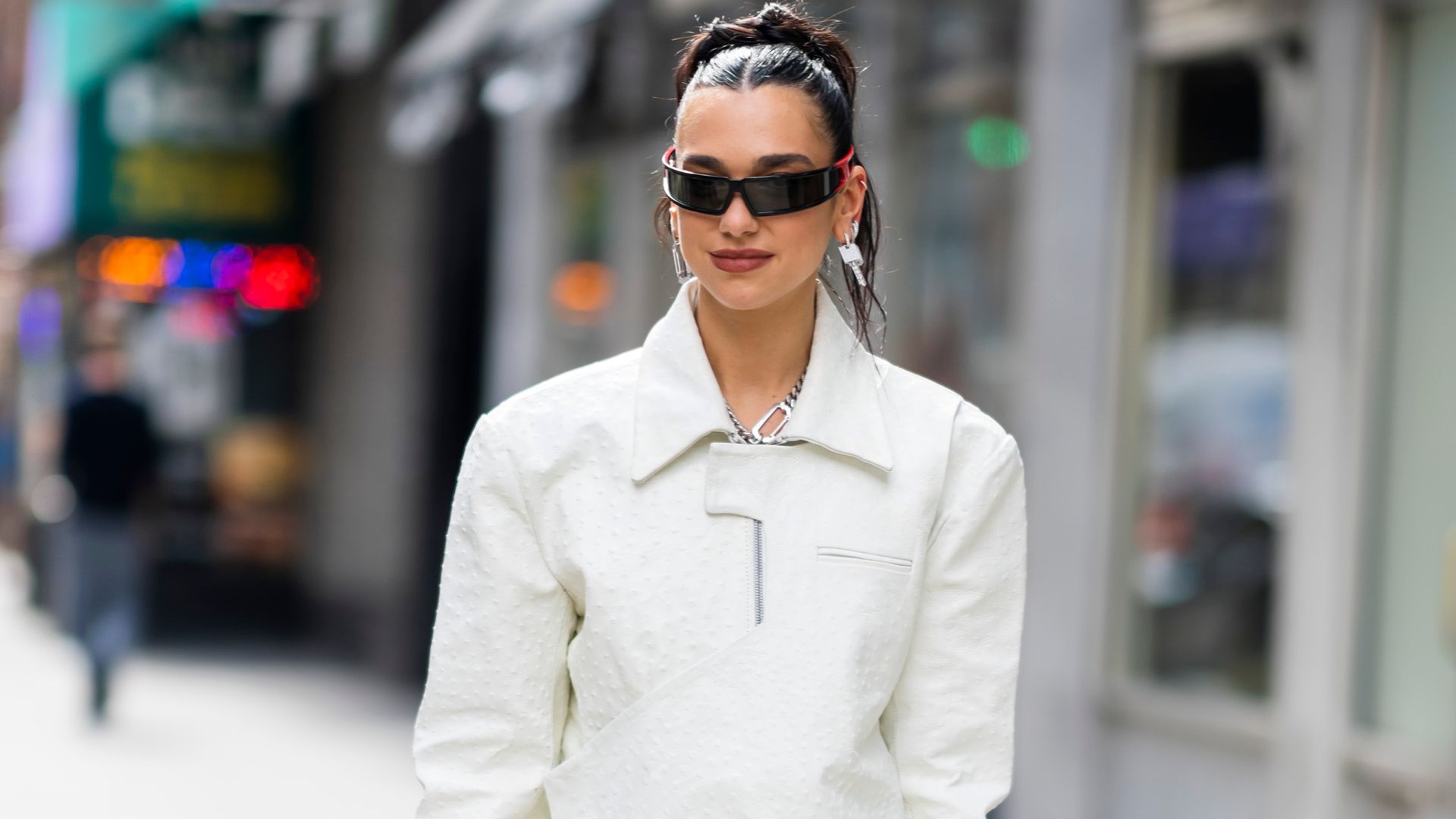 Dua's style oscillates between futuristic fashion and girlish glamour 