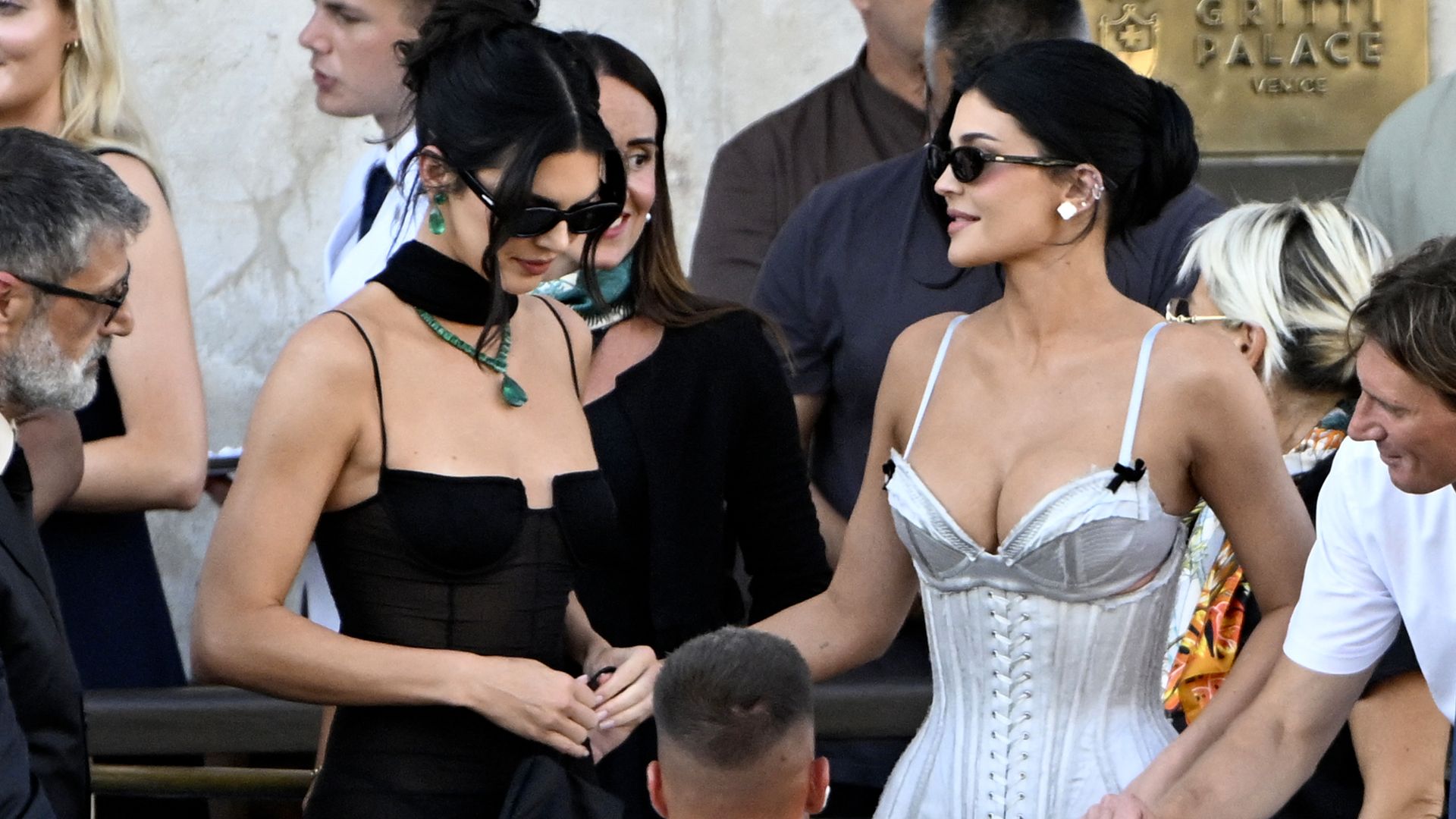 Kylie Jenner and US model Kendall Jenner leave the Gritti Palace Hotel on the wedding day of Amazon founder Jeff Bezos with Lauren Sanchez, in Venice on June 27, 2025. 