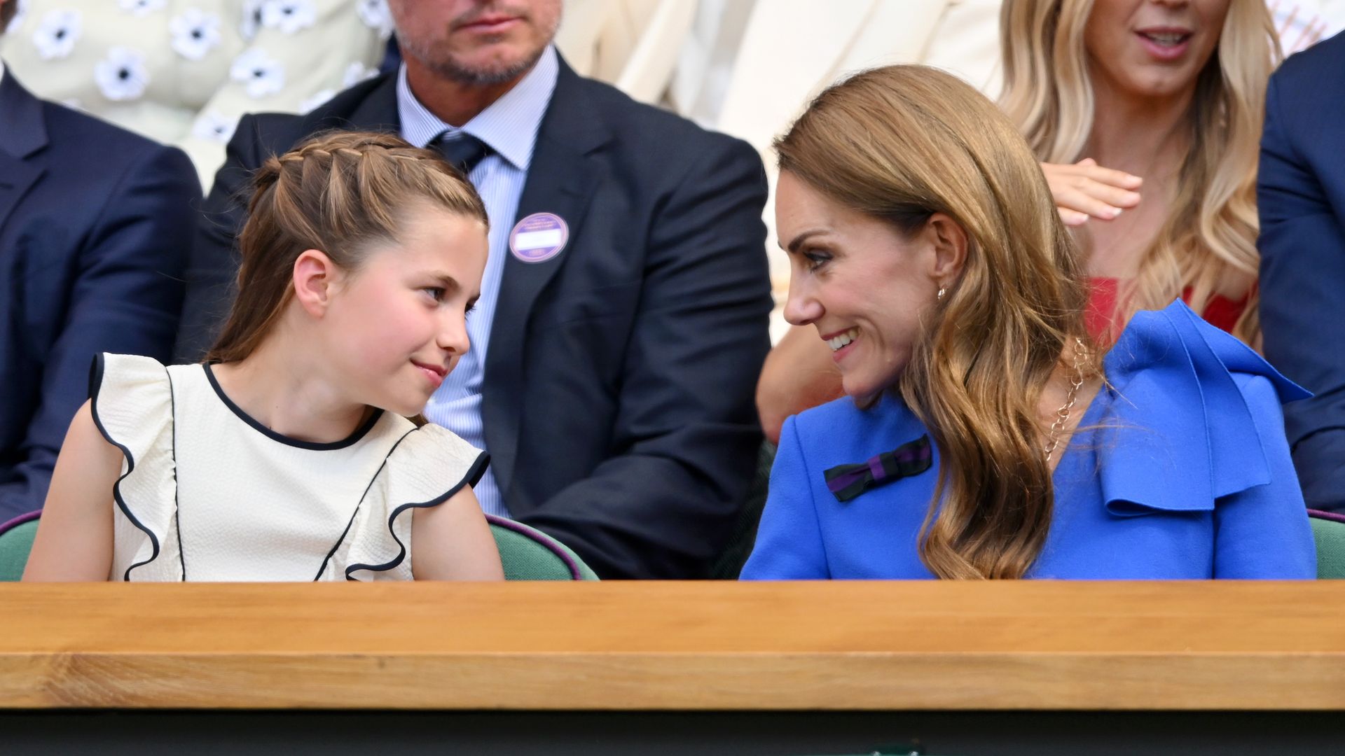 Kate and Charlotte smiling at each other