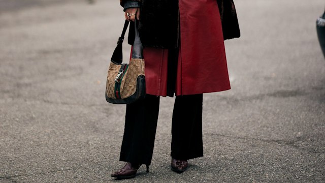 women in red skirt and trousers