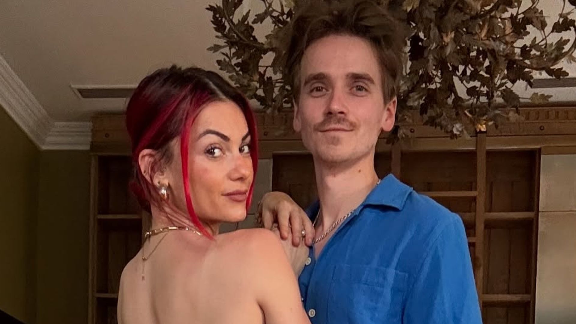 Dianne Buswell and Joe Sugg posing amid engagement rumours