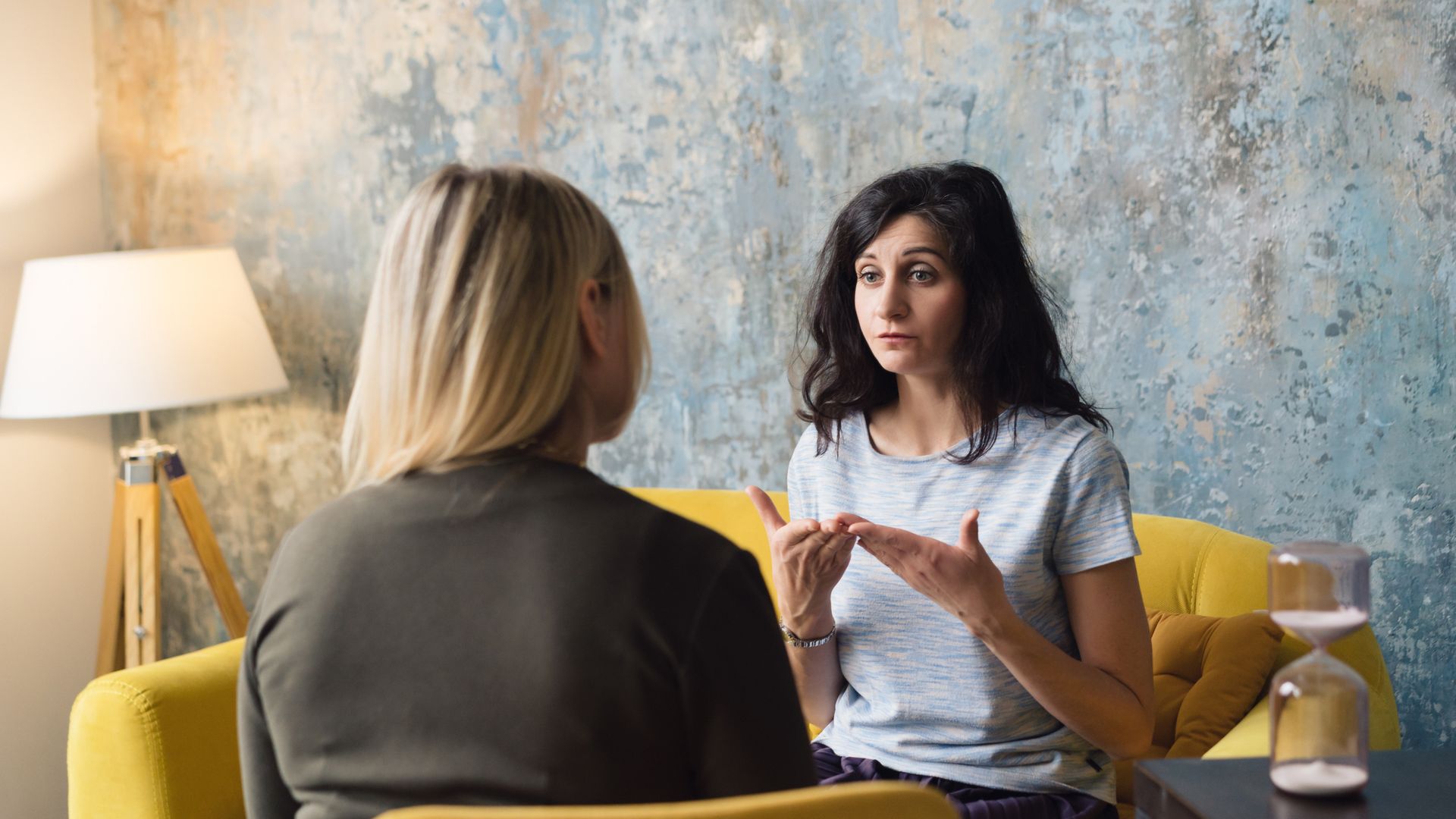 Woman psychologist talking to patient - stock photo 	Fiordaliso