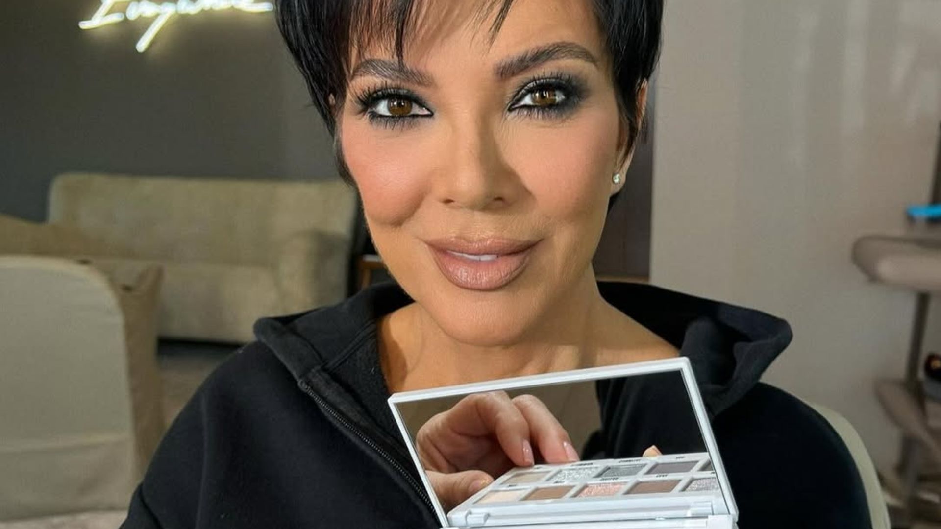 kris jenner holding eyeshadow palette