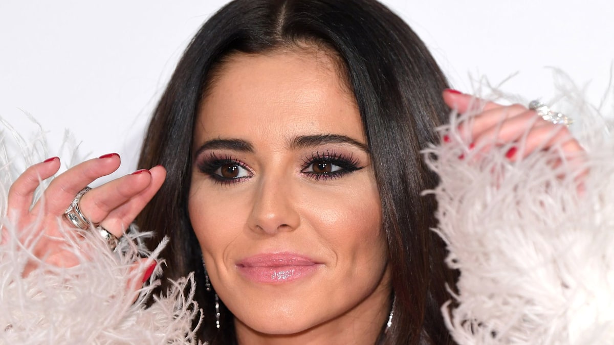 Cheryl stuns in sleek gown and new hairstyle