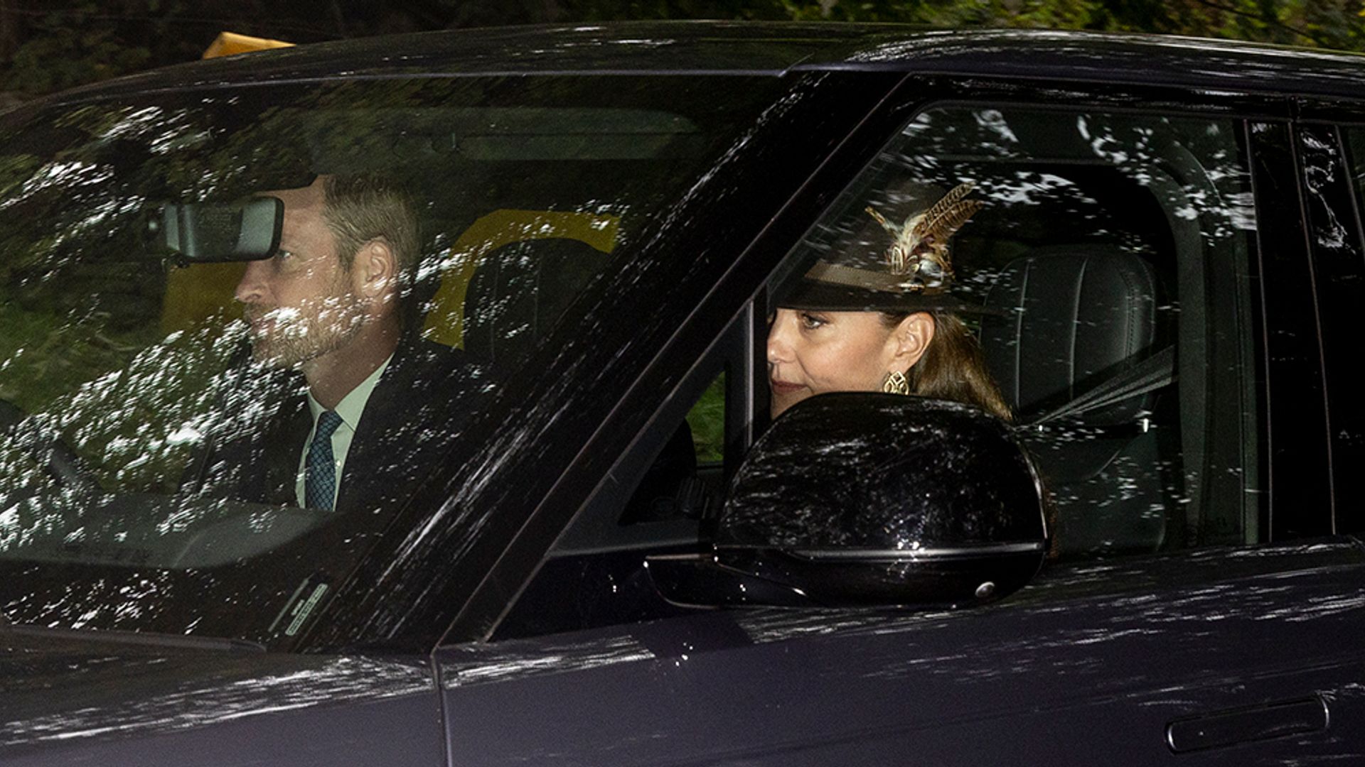 Kate is all smiles alongside Prince William as they travel to Balmoral to join King Charles at church