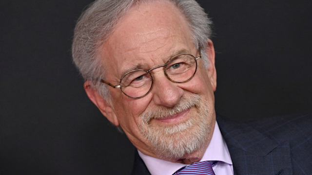 Steven Spielberg smiling at an event photo call