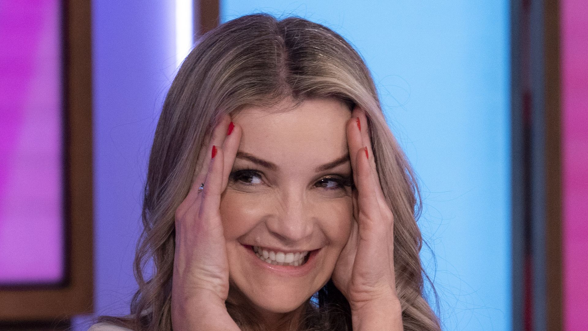 Helen Skelton with her head in her hands