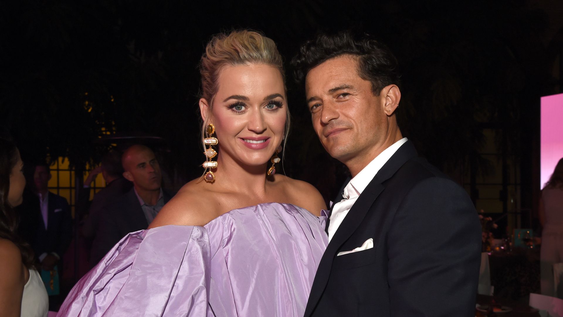 Katy Perry wows in lilac strapless ballgown next to husband Orlando Bloom