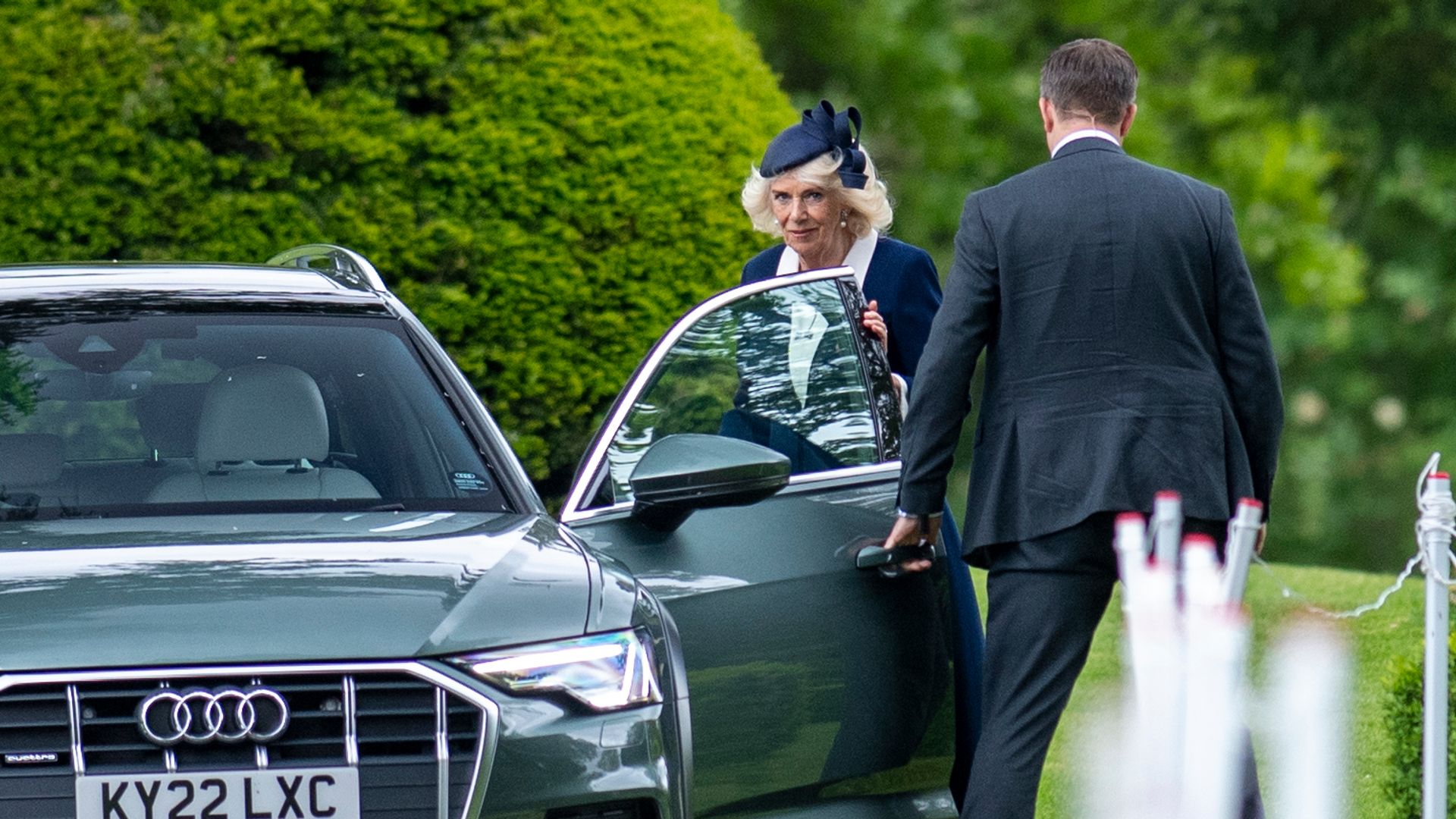 Queen Camilla getting out of a car
