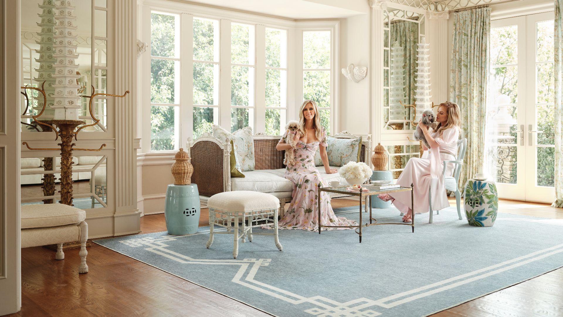 Kathy and Nicky Hilton pose in pink dresses for their new Ruggable collab