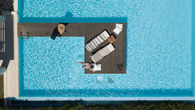 aerial view of a pool at the ixian grand & all suites