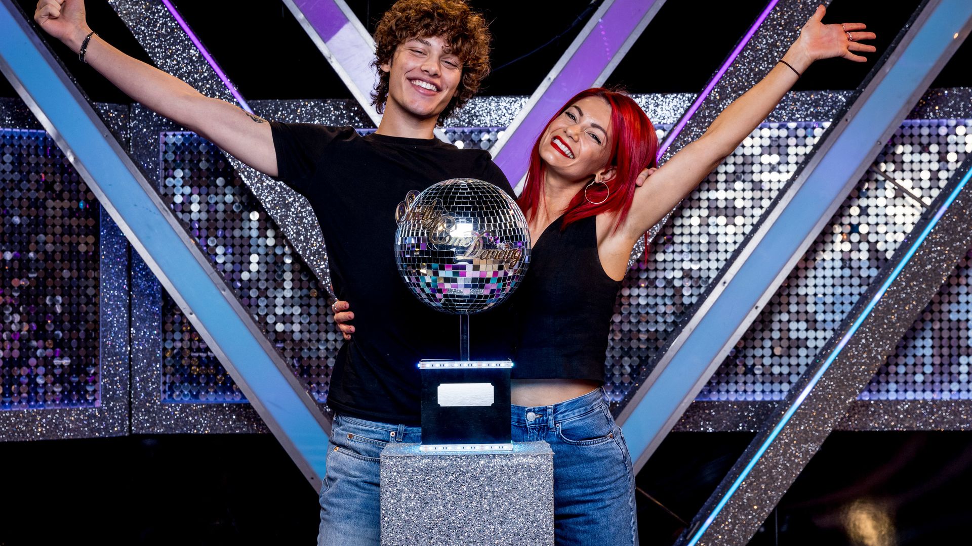 Bobby Brazier and Dianne Buswell lift the Glitterball trophy