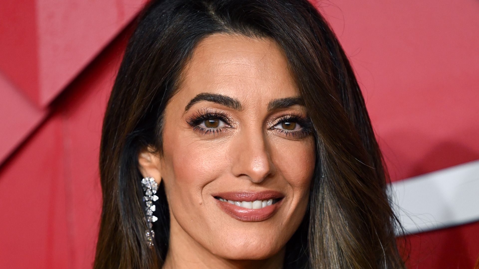 Amal Clooney is breathtaking in striking corseted gown for outing with ...