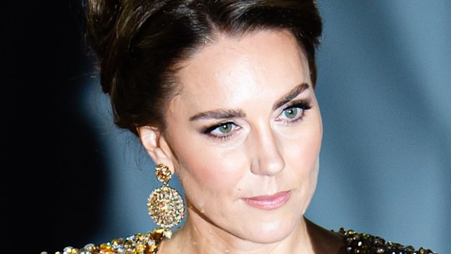  Catherine shoulders up in gold dress