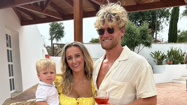 Tiffany Watson holding baby son with husband