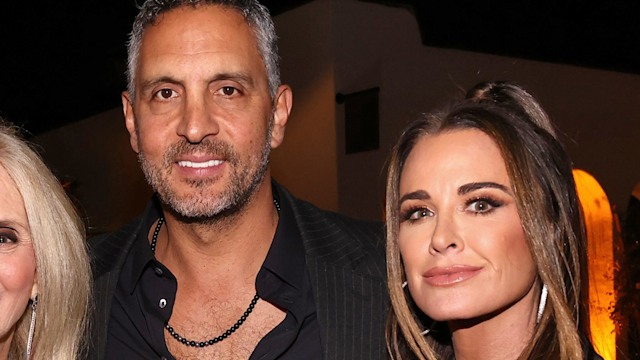 Mauricio Umansky and Kyle Richards smiling for a photo