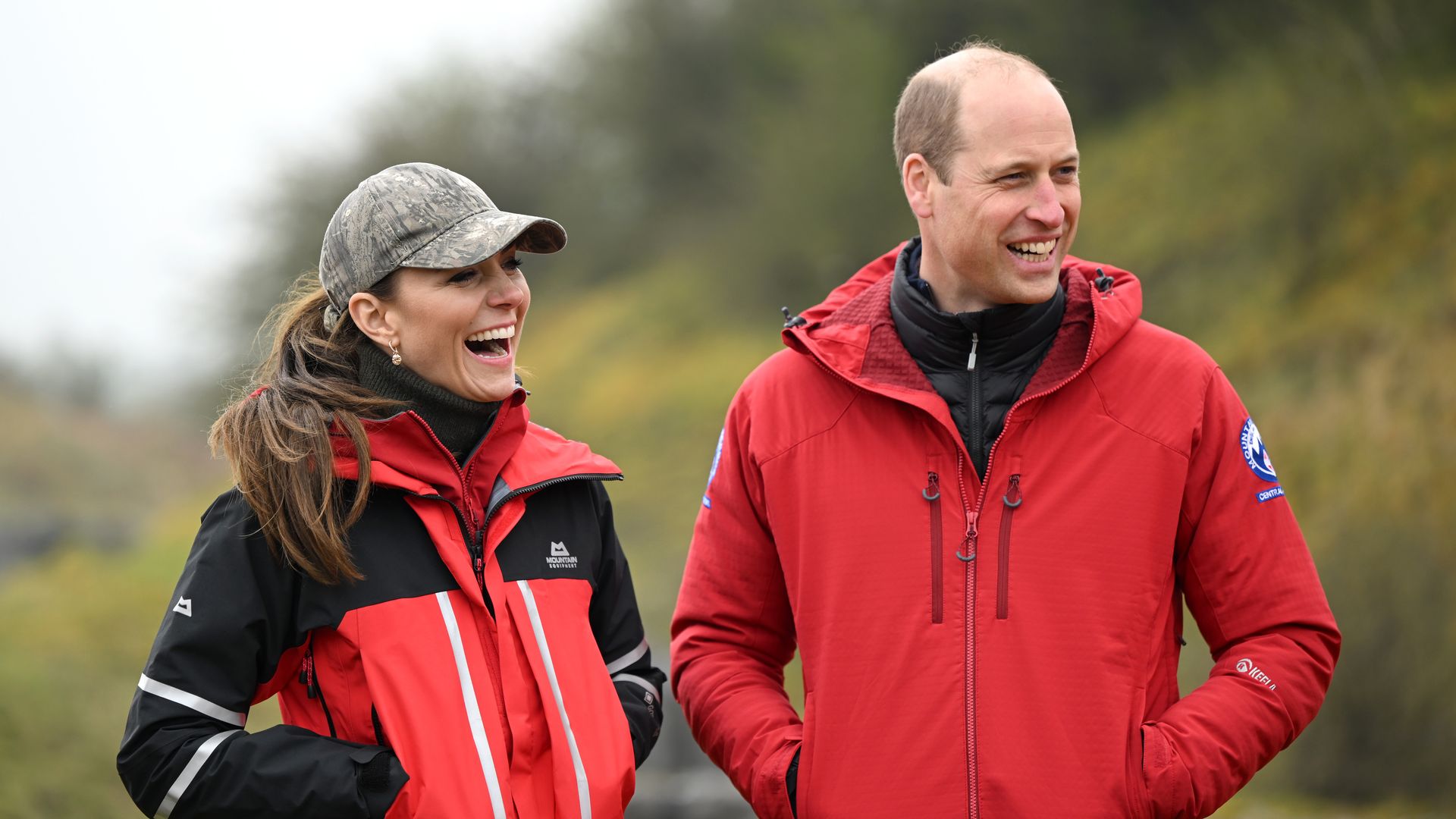 William and Kate laughing with mountain rescue team in Wales