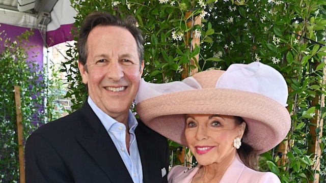 couple posing for photos at garden show