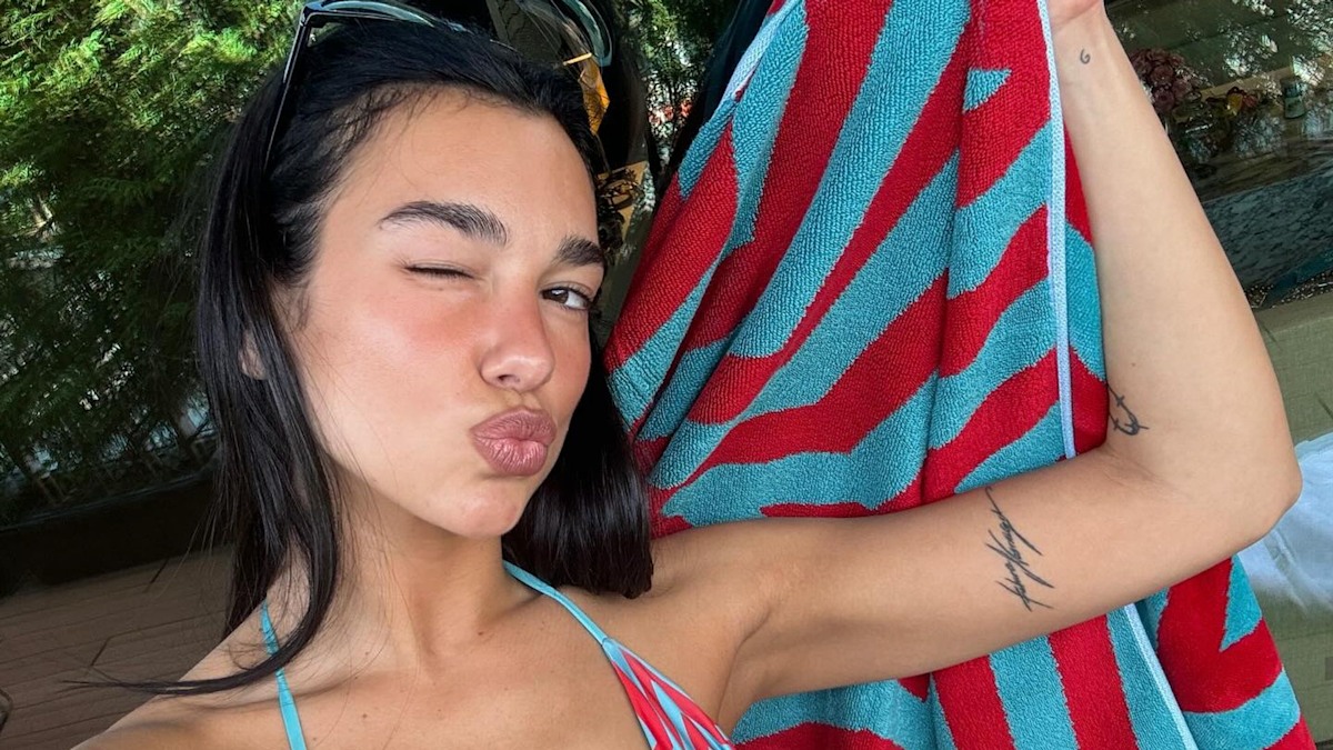 Dua Lipa's winter sun wardrobe features itsy bitsy bikinis, sequin bras, and chunky charm necklaces