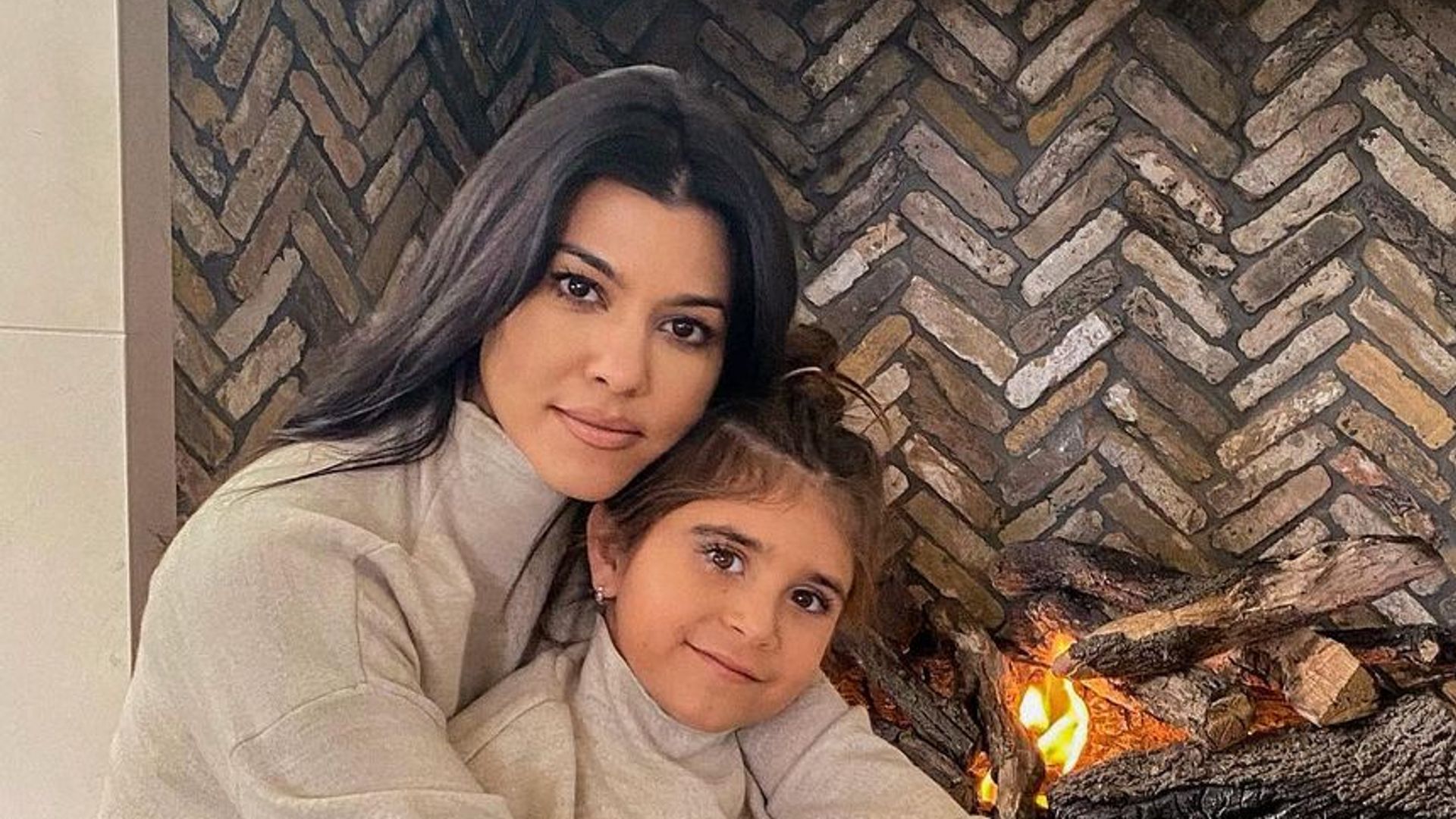 Kourtney Kardashian and daughter Penelope pose in matching pajamas
